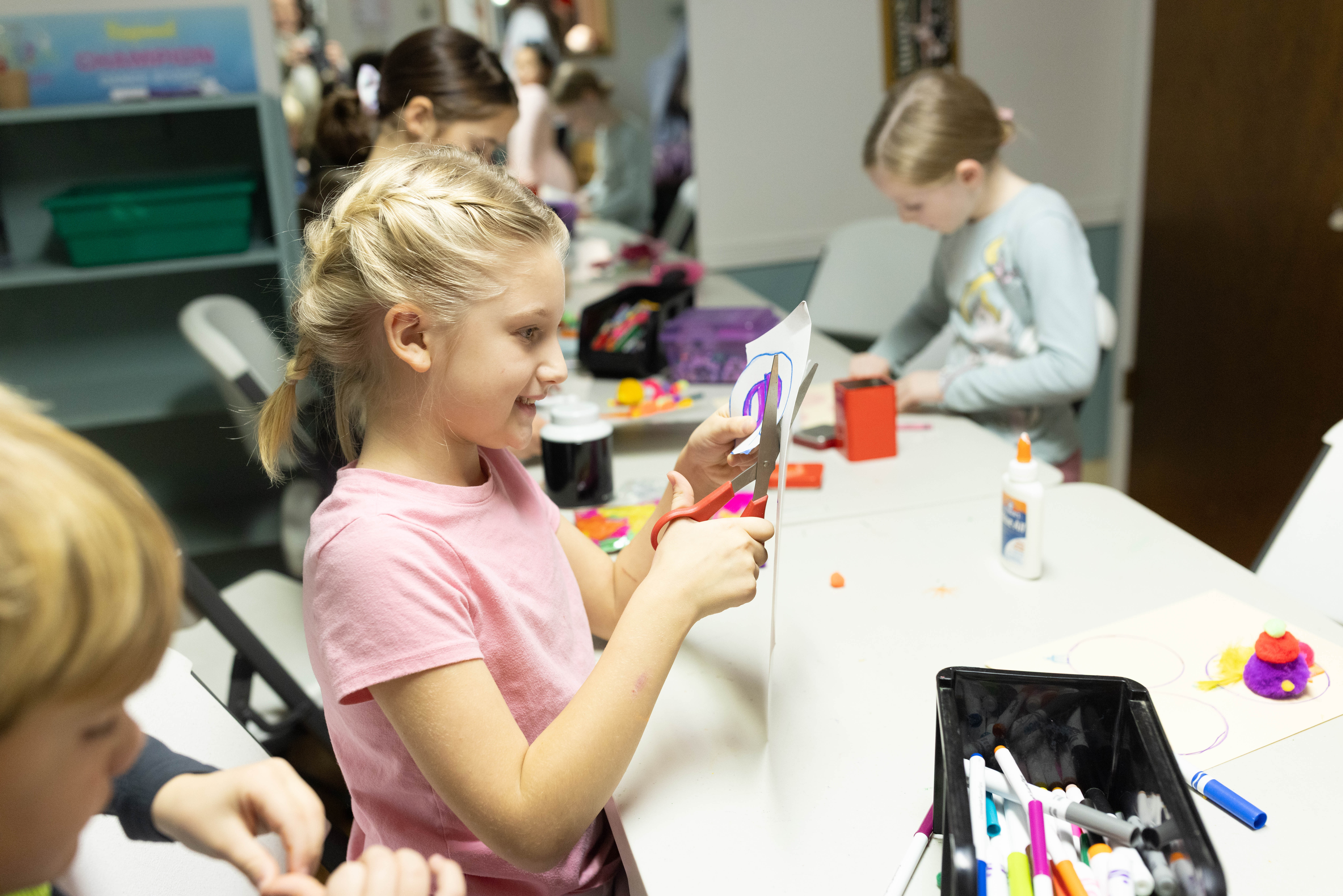 child doing arts and crafts